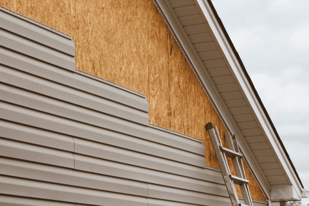 Vinyl siding installation in progress on a home exterior in Westchester NY