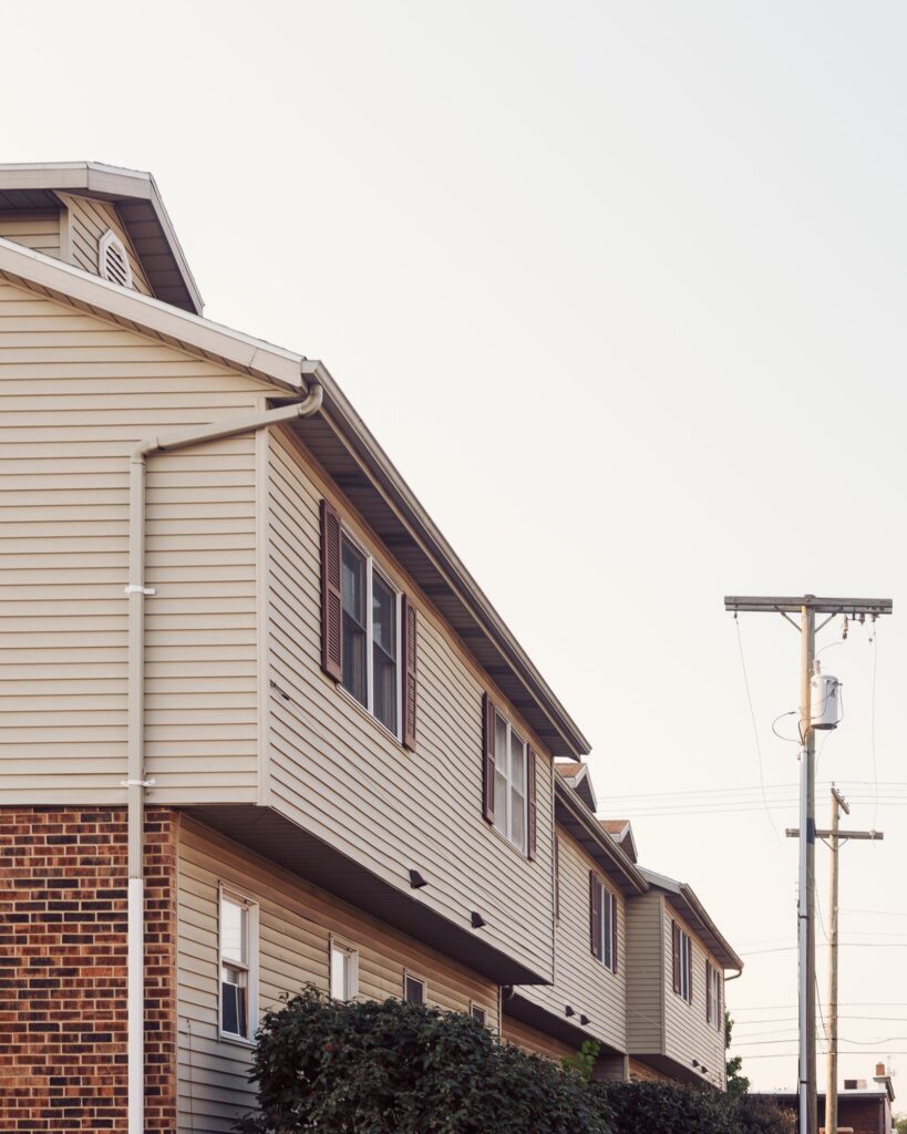 Contemporary suburban homes with brick and siding exterior in a residential Westchester NY area